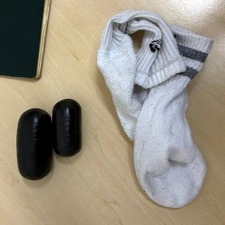 Die Päckchen Kokain und die Tennissocke